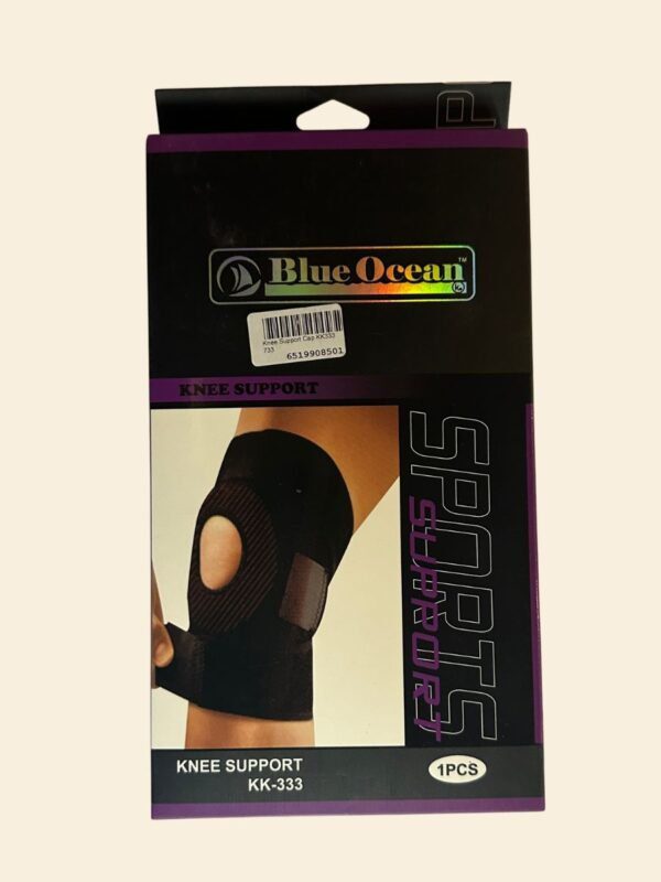 Adjustable knee support with strap